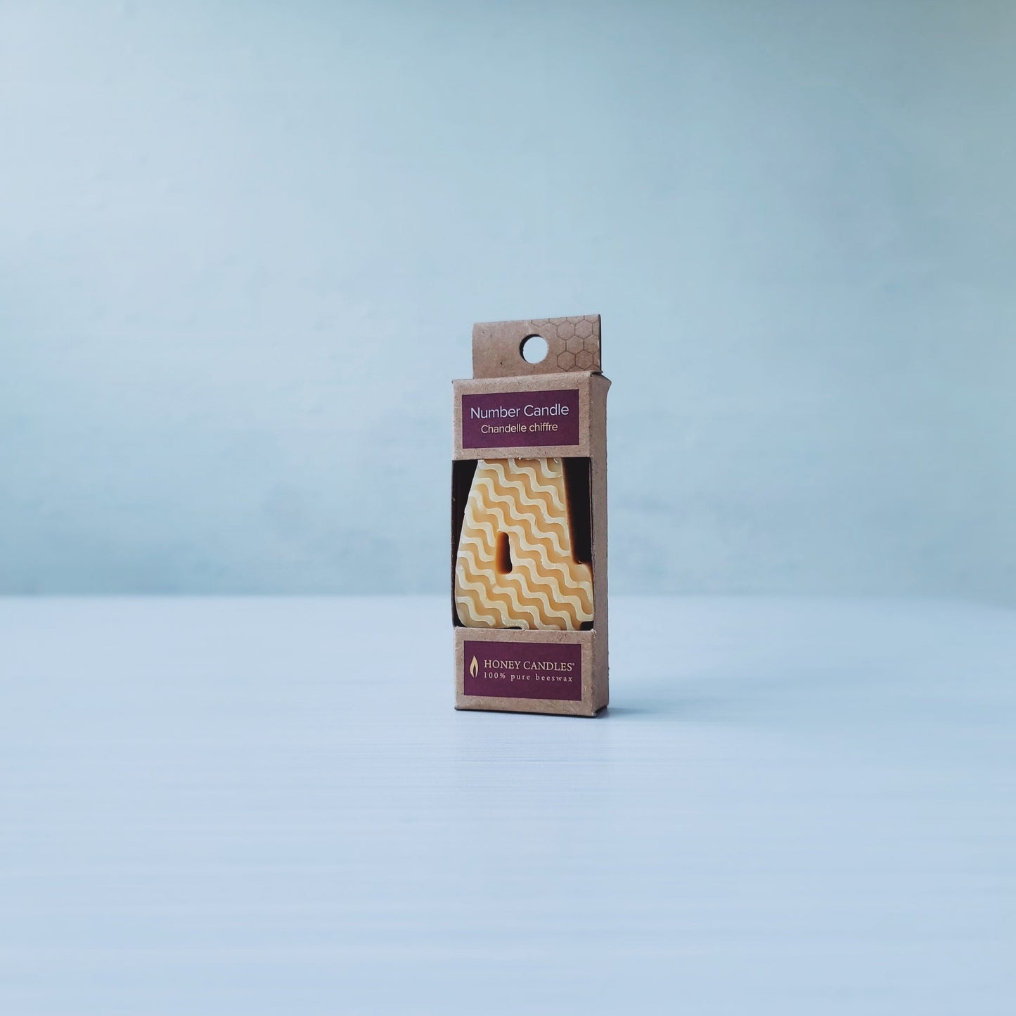 Number four candle, all natural. Yann Haute Patisserie, authentic French dessert bakery for the best croissants, cakes, chocolate, bread & macarons! Visit our yellow house at 320, 23rd Ave SW in Calgary.