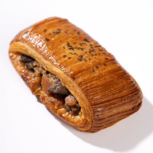 Buttery Pain Suisse croissant filled with traditional French boeuf bourguignon, tender beef, carrots and potatoes.