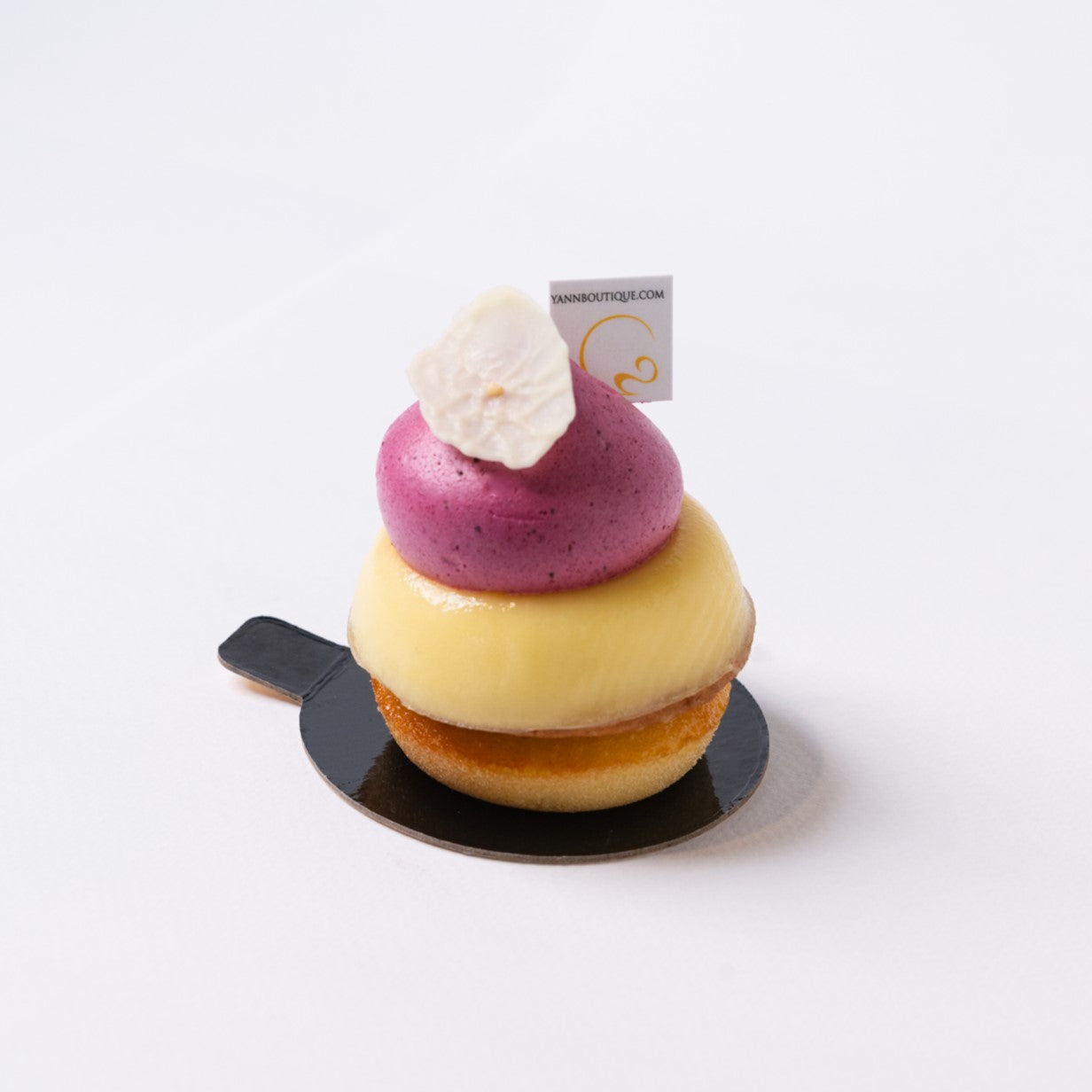 Lemon cake with a twist of blackcurrant! This cake is for you! Desserts, macarons, cakes, croissants, bread, ice cream & more are Yann Haute Patisserie, authentic French pastry & bake shop since 2009 - FREE PARKING at the back of the yellow house.