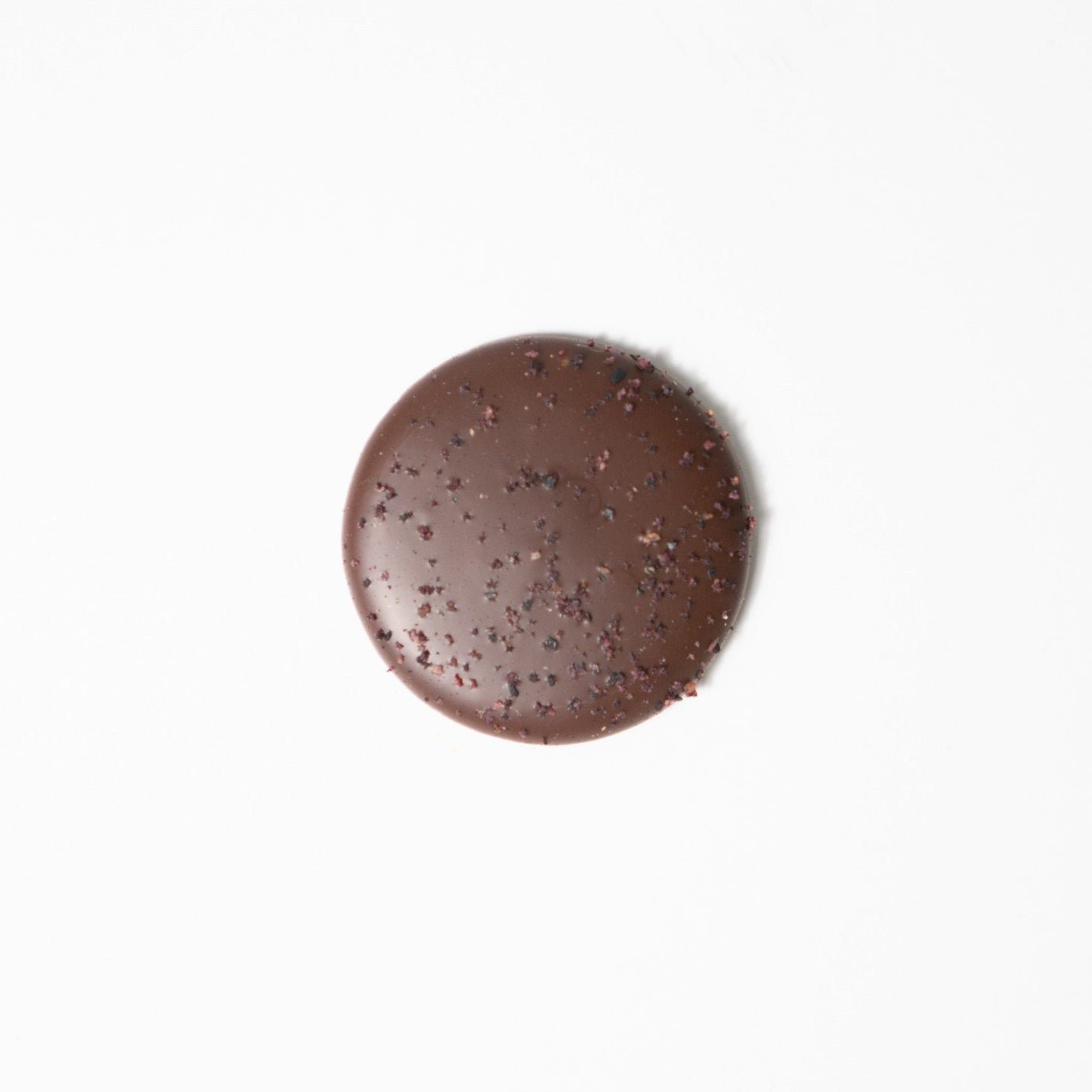 Chocolate palet made with Valrhona, best chocolate. Only real and natural ingredients at Yann Haute Patisserie, authentic & traditional French bakery & pastry shop in a yellow house in Calgary. Relais Desserts Pastry chef Yann Blanchard creates desserts, cakes, macarons, ice cream, Canneles, croissants, baguette & bread.