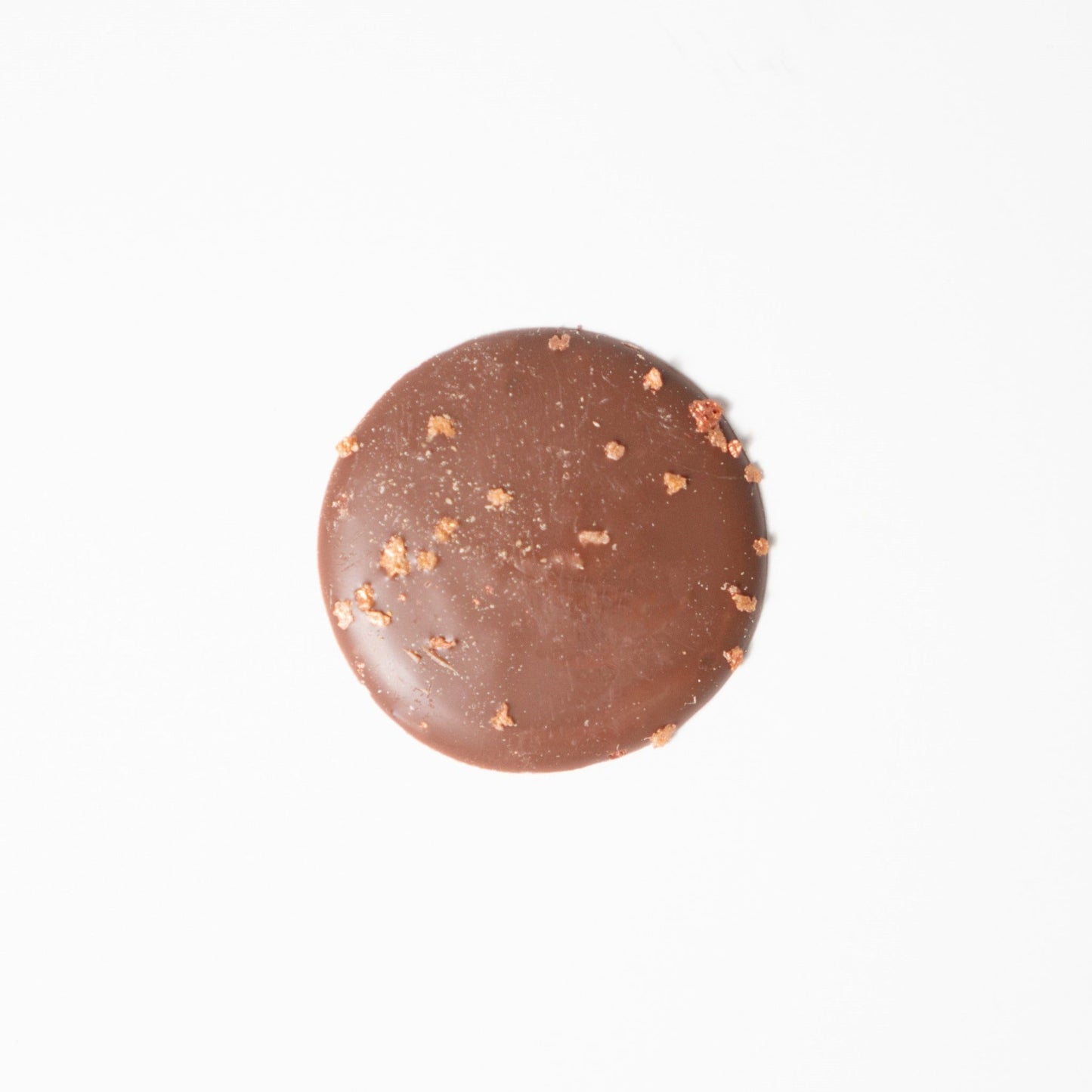 Chocolate palet made with Valrhona, best chocolate. Only real and natural ingredients at Yann Haute Patisserie, authentic & traditional French bakery & pastry shop in a yellow house in Calgary. Relais Desserts Pastry chef Yann Blanchard creates desserts, cakes, macarons, ice cream, Canneles, croissants, baguette & bread.