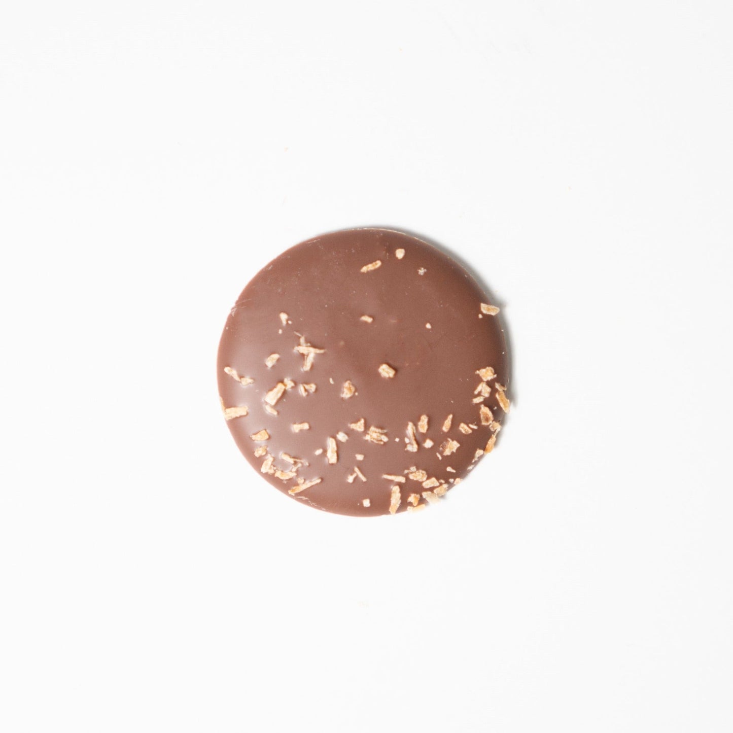 Chocolate palet made with Valrhona, best chocolate. Only real and natural ingredients at Yann Haute Patisserie, authentic & traditional French bakery & pastry shop in a yellow house in Calgary. Relais Desserts Pastry chef Yann Blanchard creates desserts, cakes, macarons, ice cream, Canneles, croissants, baguette & bread.