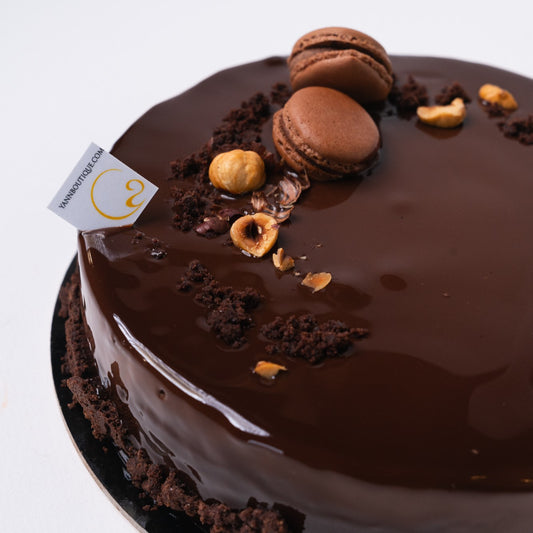 Elegant chocolate bavaroise cake with hazelnut crunch, handmade in Calgary.