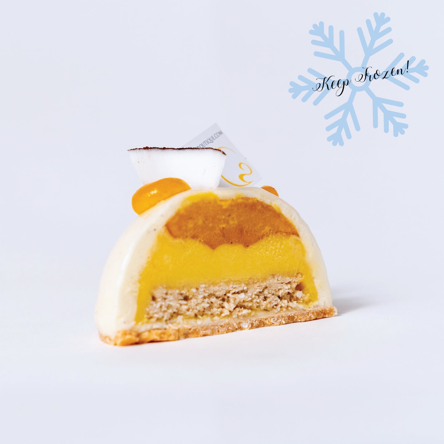 Vegan frozen dessert featuring coconut crunch, passion fruit compote, and mango sorbet