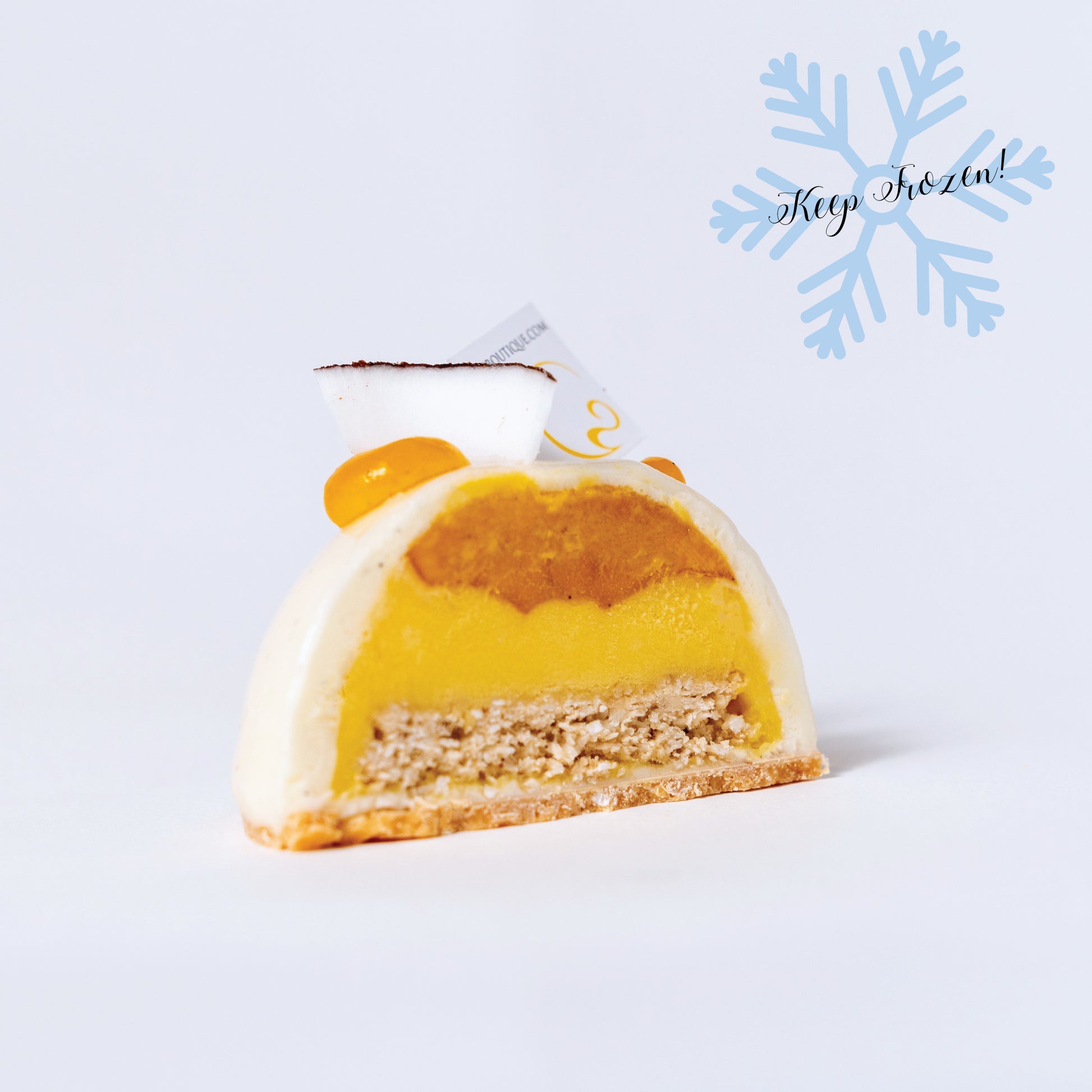 Vegan frozen dessert featuring coconut crunch, passion fruit compote, and mango sorbet