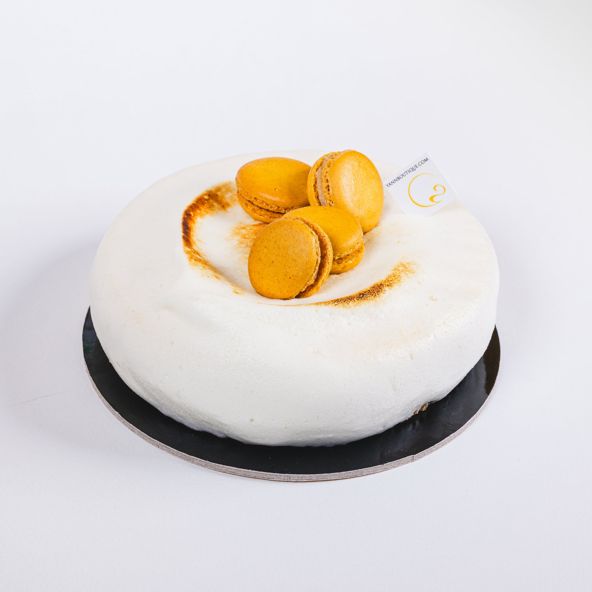 Gluten-free French lemon tart crafted with almond cake, lemon crémeux, crushed lemon compote, and soft meringue topping