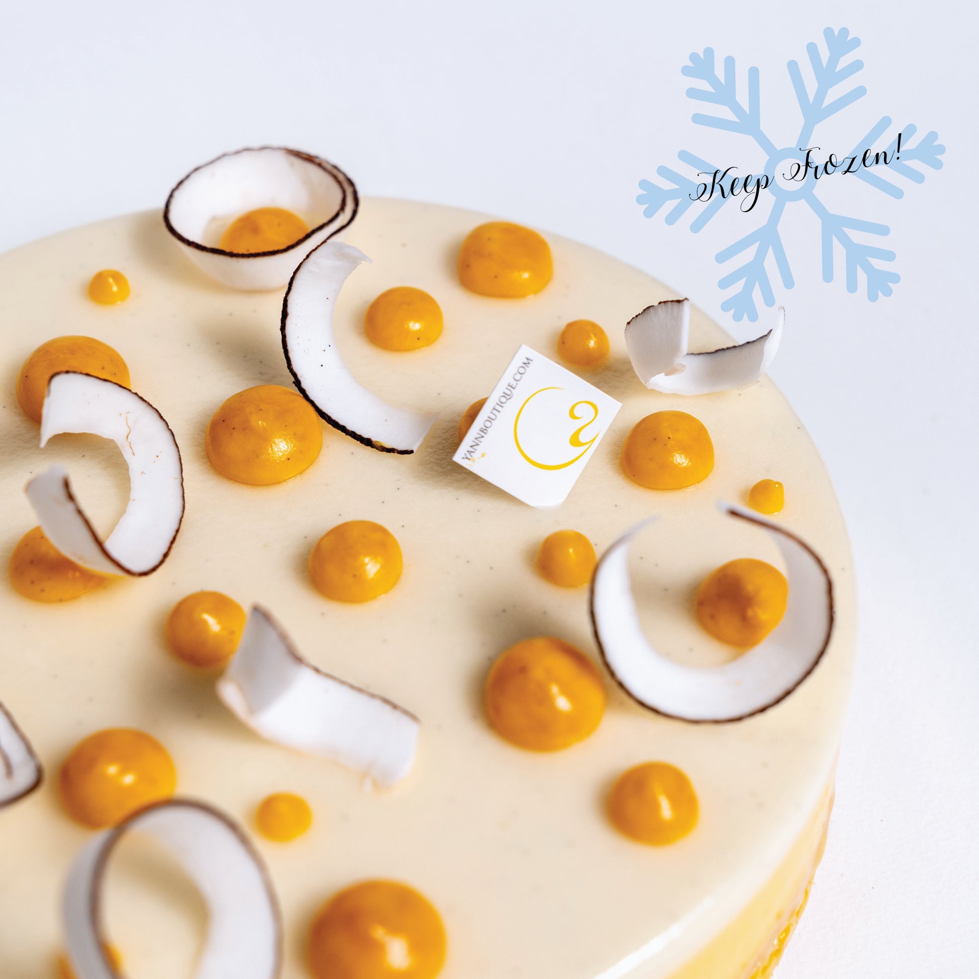 Tropical coconut and passion fruit dessert handcrafted by Yann Haute Patisserie