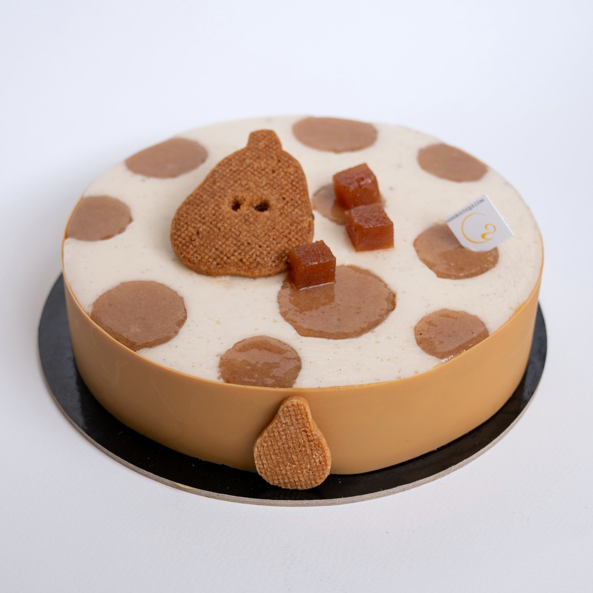 Description: White sacher cake, pear &amp; chestnut compote, light haupia, maple/buckwheat sable.