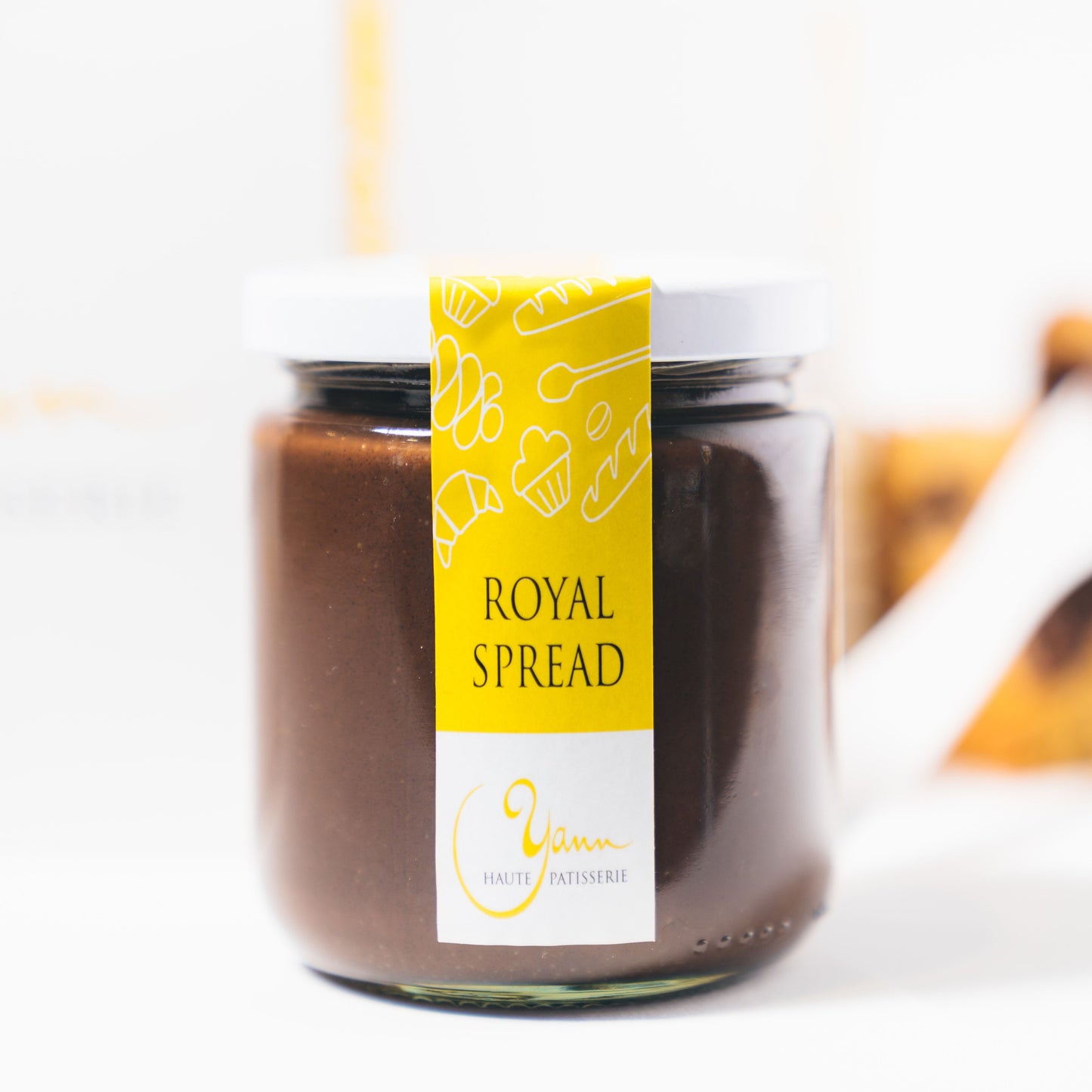 The best & only chocolate & hazelnut spread your bread or brioche needs!  Made in-house: from roasting hazelnuts, making the paste and mixing quality Valrhona chocolate, chef Yann made sure to create a gourmet treat. It may make it to your bread but a spoon may just do!