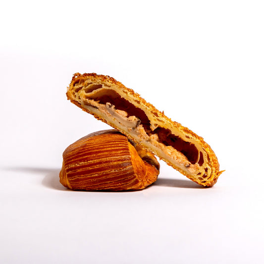 Indulge in authentic French pastries and cakes at Yann Haute Patisserie in Calgary. Located on 23 Avenue Southwest in a charming yellow house, our bakery offers macarons, Tiramisu, Mille Feuille, birthday cakes, baguettes, croissants, and chocolates. Catering to dietary needs, we provide gluten-free, dairy-free, egg-free, and vegan options.