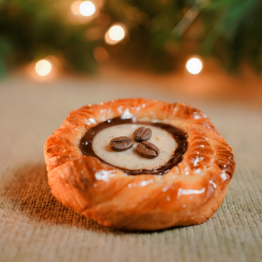 Tiramisu Croissant filled with mascarpone cream and espresso-soaked sponge from Yann Haute Patisserie